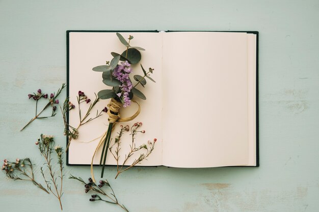 Small bouquet on opened notebook