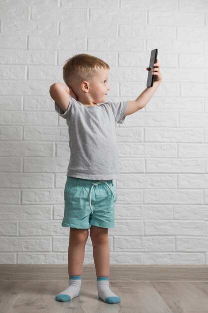 Small boy using phone mock-up