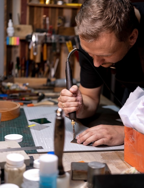 Free photo small business manager in his workshop