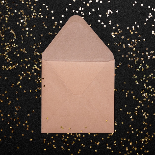 Small envelope with spangles on table