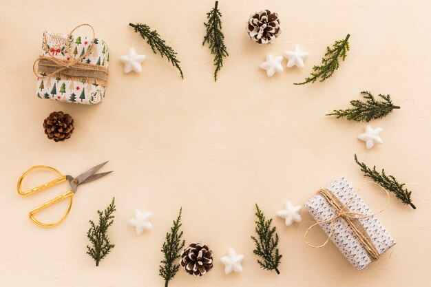 Small gift boxes with green branches 