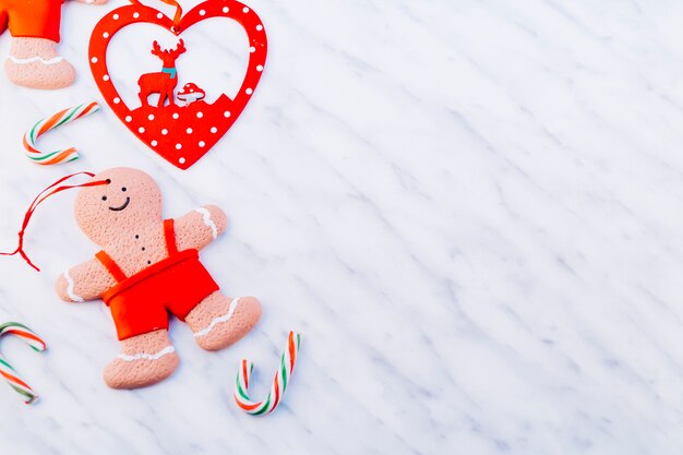 Small gingerbread man on white table