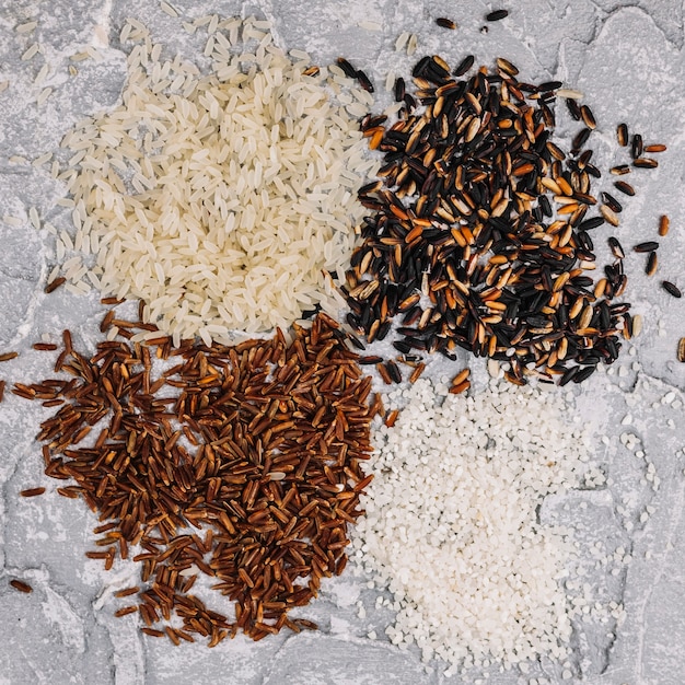 Free photo small heaps of assorted rice