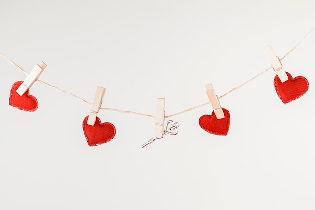 Small hearts hanging on rope
