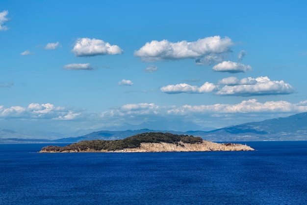 Small island at the sea near Olympiada village in Greece