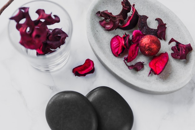 Small rocks near petals