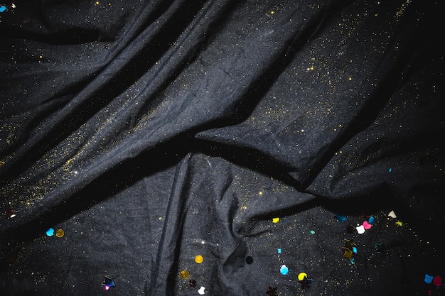small spangles on black canvas 