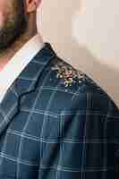 Free photo small spangles on man shoulder