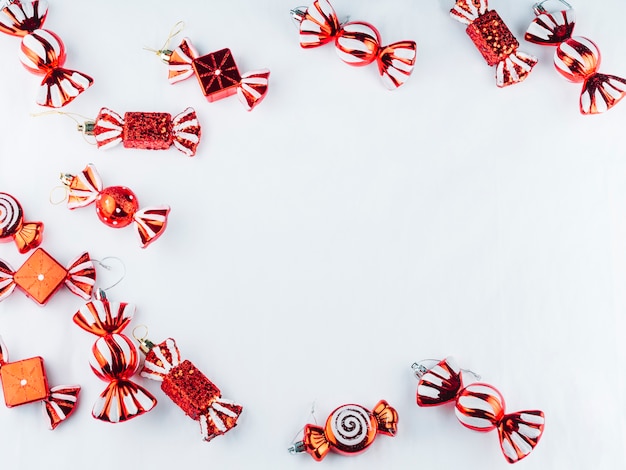 Small toy candies on white table