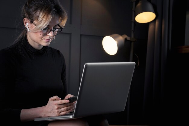 Smart businesswoman working on her laptop