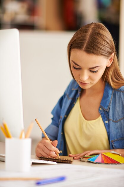 Smart girl working on his project