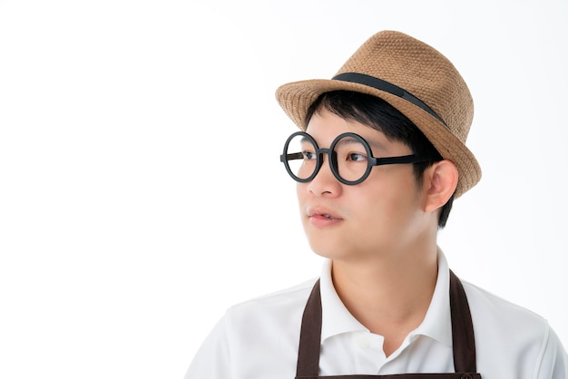 Smart glasses happiness asian friendly shop owner wear brown apron portrait half body smile and look to camera isolate white background