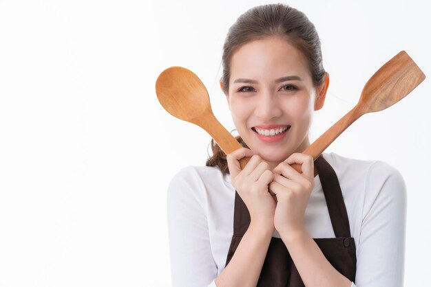 Smart happiness asian friendly shop owner wear brown apron portrait half body smile and look to camera isolate white background