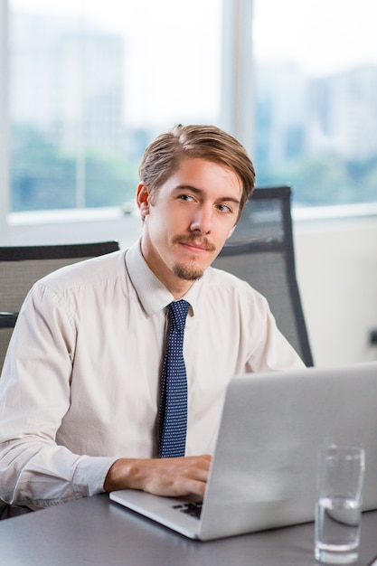 Smart man working on a laptop