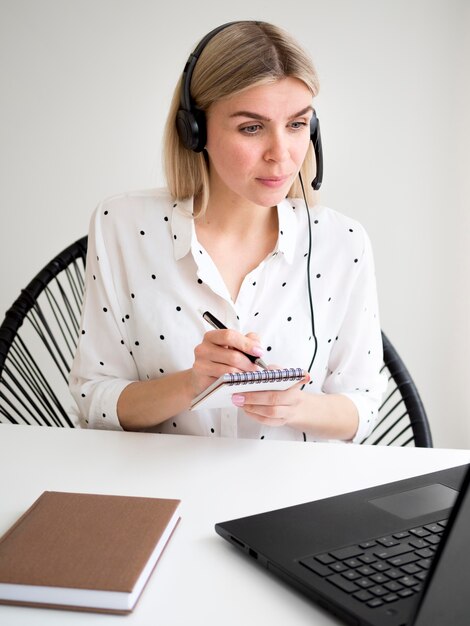 smart young student looking at laptop