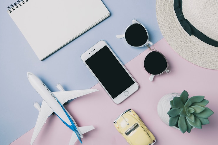 無料Photo 旅行用品の中のスマートフォン