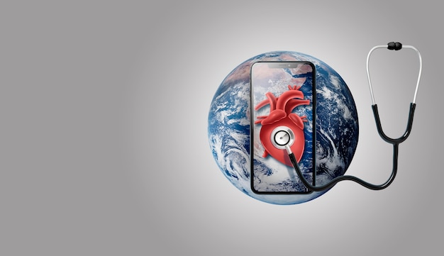 Free photo smartphone on earth with stethoscope on a heart