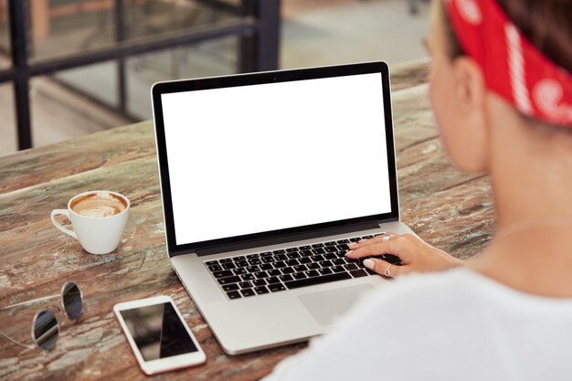 Smartphone and laptop with blank screens