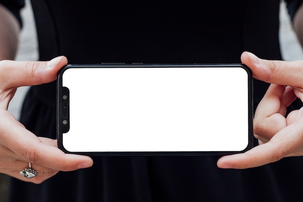 Smartphone screen hold by a person