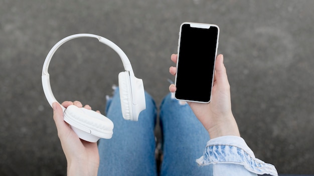 Smartphone with a pair of headphones