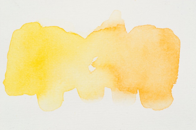 Smears of bright yellow watercolor