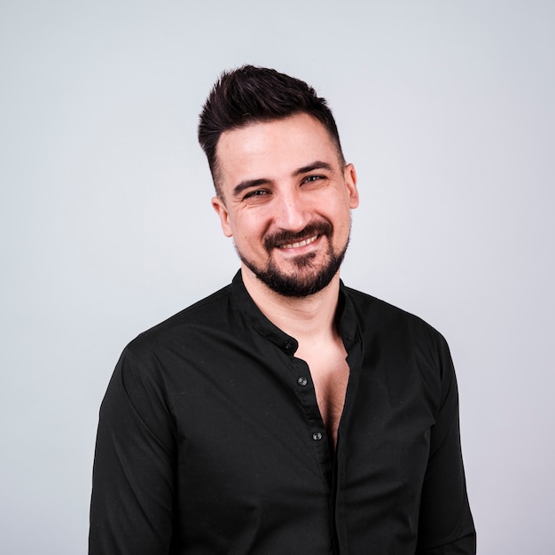 Smiley bearded man in black shirt