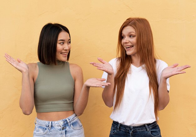 Smiley beautiful women posing together