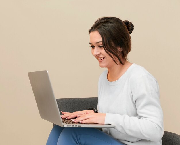 Smiley businesswoman working indoors