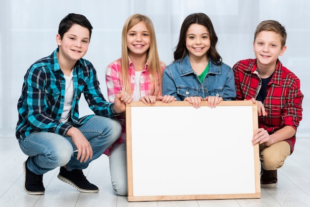 Smiley childrens holding frame