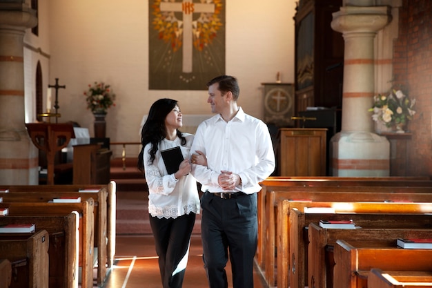 Free photo smiley christian couple walking together