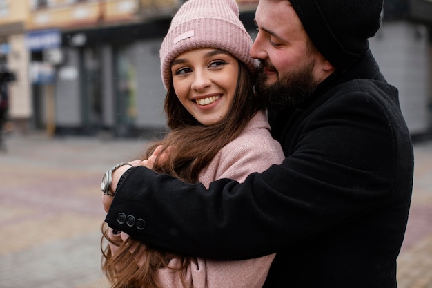 Smiley couple hugging