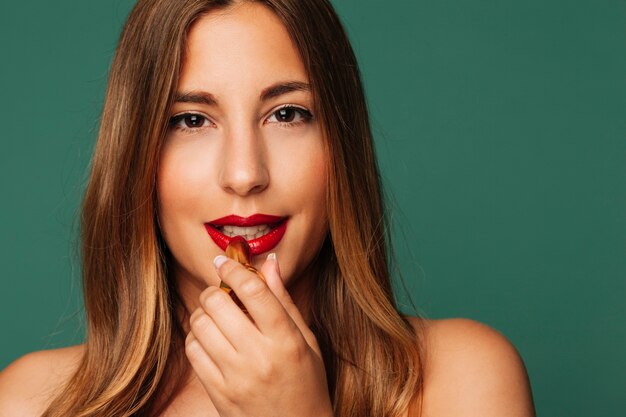 Smiley cute girl with lipstick