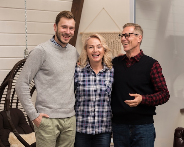 Smiley family posing together at home