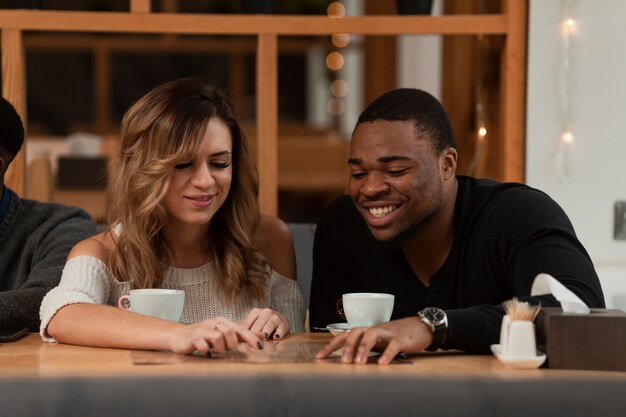 Smiley friends enjoying coffee