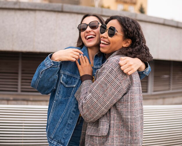 Smiley friends having fun together outdoors