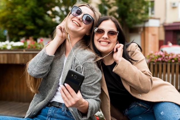 Smiley friends listening to music