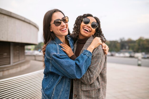 Smiley friends posing together outdoors