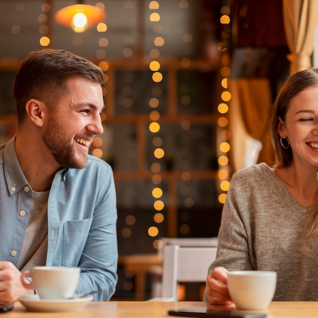 Smiley friends at restaurant