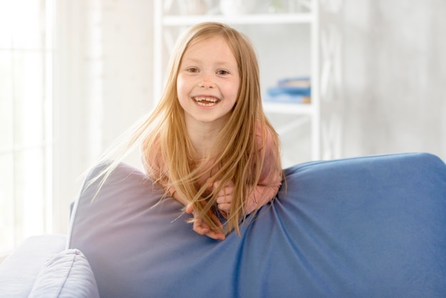 Smiley girl at home