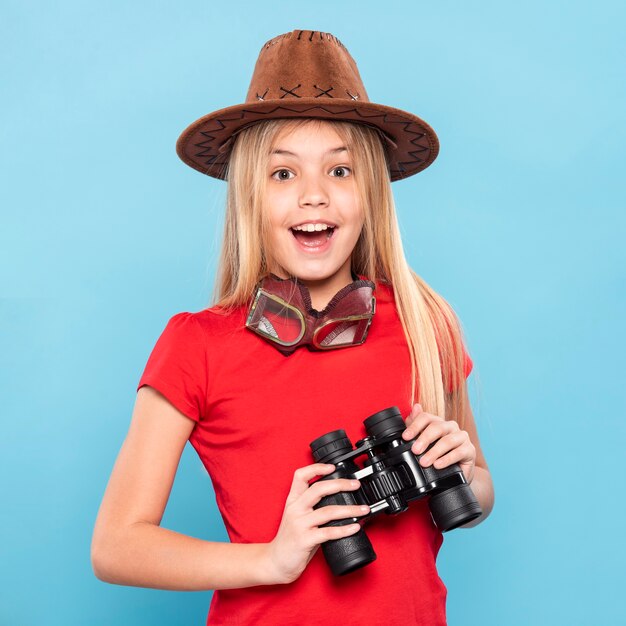Smiley girl with binocular