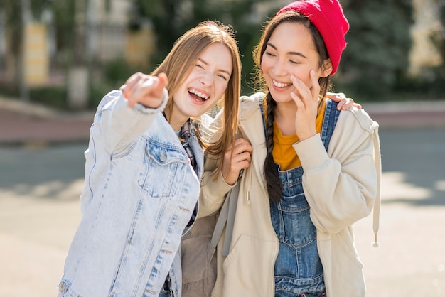 Smiley girlfriends having fun