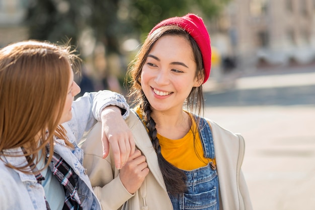 Free photo smiley girlfriends together