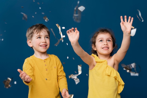 Smiley little kids celebrating