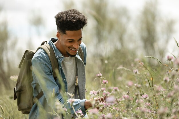 Smiley man outdoors medium shot