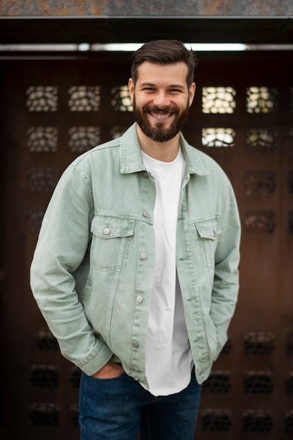 Free photo smiley man posing for cv front view