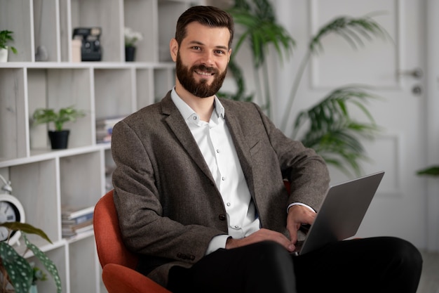 Smiley man posing for cv medium shot