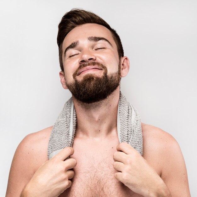 Smiley man posing shirtless