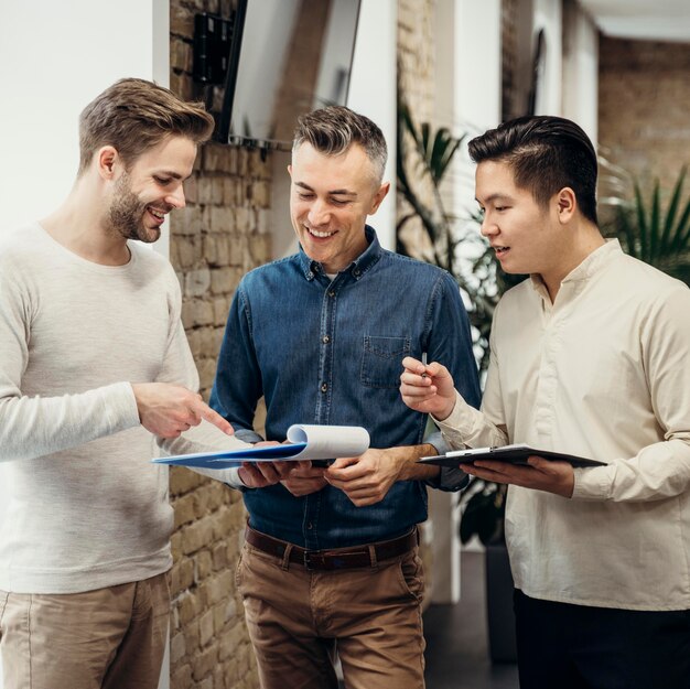 Smiley men talking about a project