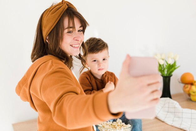 Smiley mom taking selfie