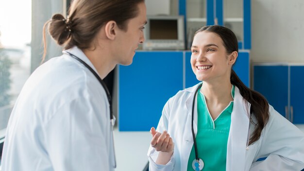 Free photo smiley nurses talking